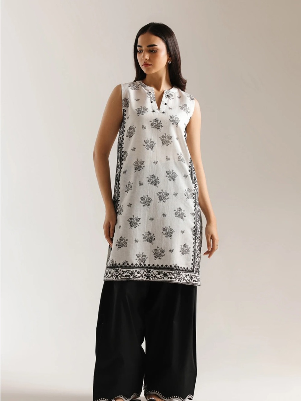 Sleeveless White & Black Floral & embroidered shirt & bottom